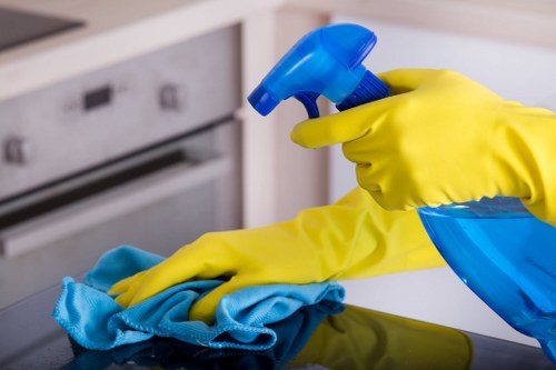 Local technician assessing upholstery stain cleaning in Richmond